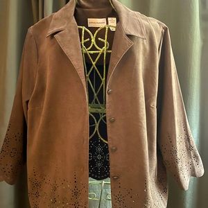 Lightweight, suede-like, brown jacket with cutout pattern.